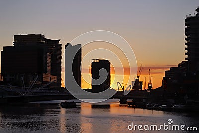 Pink sunset over skyscrapers of Melbourne downtown, Yarra River Editorial Stock Photo