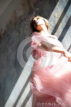Pink swan dress, frozen moment Stock Photo