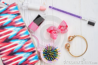 Pink toiletry bag and makeup accessories. Stock Photo