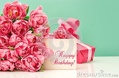 Pink tulips, gift ang greeting card Happy Birthday Stock Photo