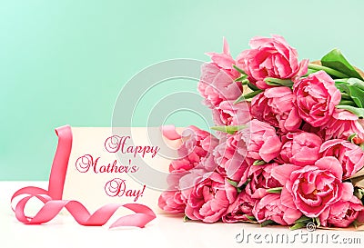 Pink tulips and greeting card. Happy Mothers Day Stock Photo