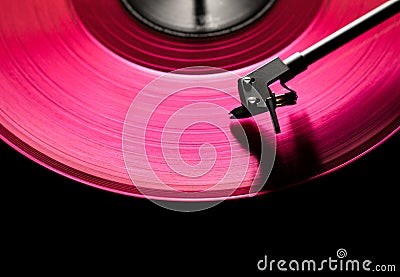 Pink vinyl disc. close-up. techno music. black background, Stock Photo