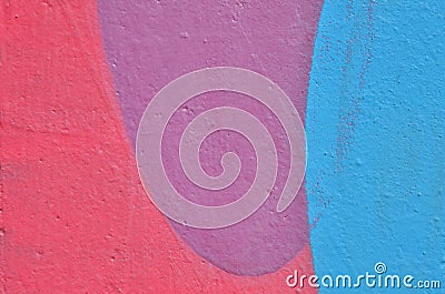 Pink, violet and blue painted wall. Multicolored graffiti abstract geometric painting. Stock Photo