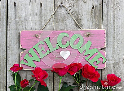 Pink Weathered Welcome Sign With Heart Hanging On Door ...