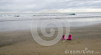 Pink wellies left at La Jolla bay -2 Stock Photo