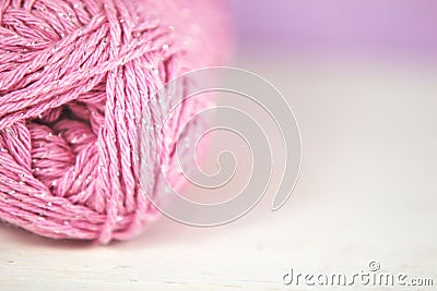 Pink yarn / wool on soft focus background. Stock Photo