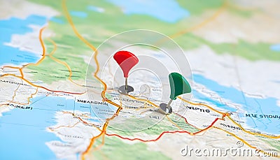 Pinning a location on a map of geography that includes mountains Stock Photo