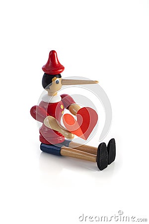 Pinocchio liar with heart Stock Photo