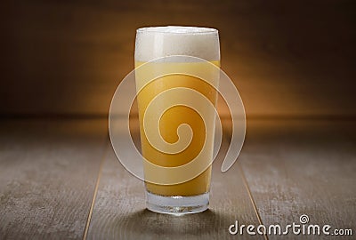 A pint of IPA, hazy unfiltered juicy draft NEIPA beer on wooden background Stock Photo