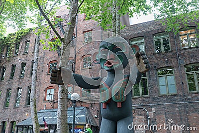 Pioneer Square Plaza in downtown Seattle, Washington, featuring Iron Pergola and Tlingit Indian Totem Editorial Stock Photo