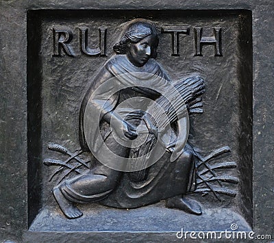 The pious Ruth, relief on the door of the Grossmunster church in Zurich Stock Photo