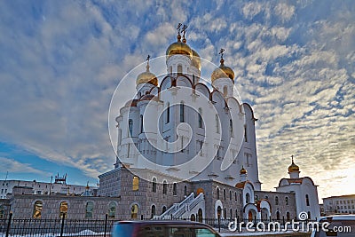 Piously-Troitsk cathedral on a decline in clouds. Magadan. Winter Stock Photo