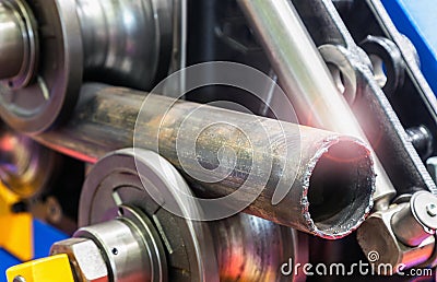 pipe bending machine in production for bending pipes Stock Photo