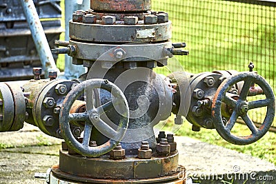 Pipe connection for two pipelines with large rotary valves and rotating wheels to control the pressure Stock Photo