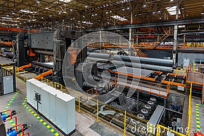 Pipe formation by using roll bending machine Stock Photo