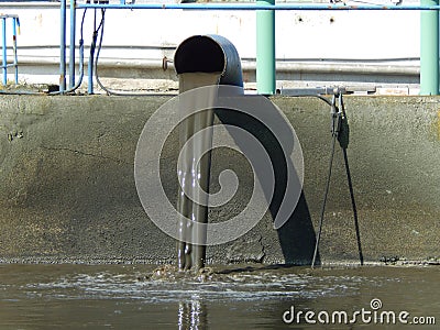Pipe with returned sludge from the activation sludge reactor Stock Photo