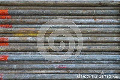 Pipe of scaffolder with orange paint color code to indicated these inspected and ready to use Stock Photo