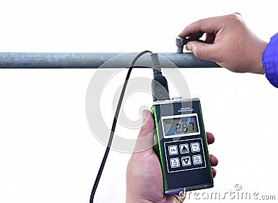 Pipe thickness measurement with UTM Stock Photo