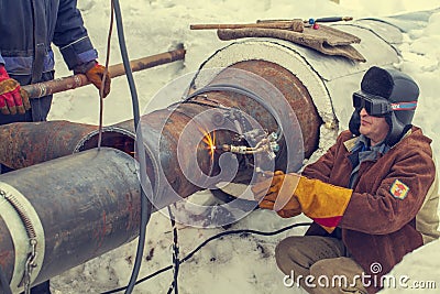 Pipeline repair, gas cutter, plasma cutting machine, hot work, electric and gas welder Editorial Stock Photo