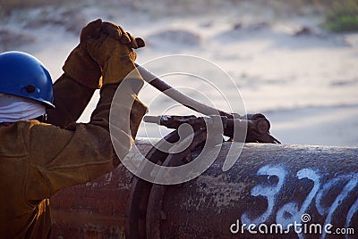 Pipes being joined together Stock Photo