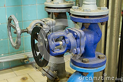 Pipes and faucet valves of heating system Stock Photo