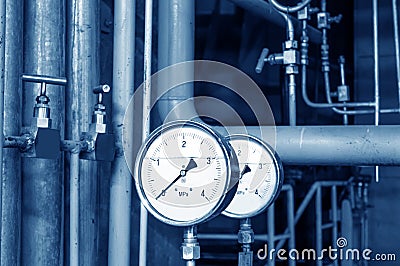 Pipes and faucet valves of heating system in a boiler room Stock Photo