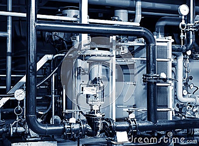 Pipes and faucet valves of heating system in a boiler room Stock Photo