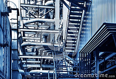 pipes and faucet valves of heating system in a boiler room Stock Photo