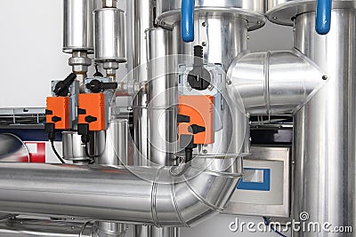 Pipes and faucet valves of heating system in a boiler room Stock Photo