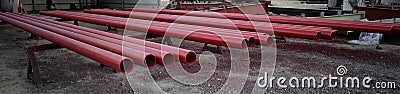 Pipes for fire fighting system and extinguishing water lines in industrial building. painted steel pipes Stock Photo