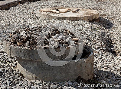 Pipes hatches repairing road Open unsecured sewer manhole in the street Stock Photo