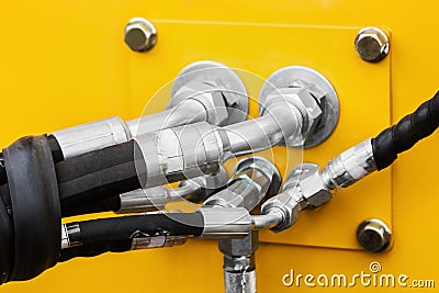 Pipes and the hydraulic system of the tractor or excavator Stock Photo