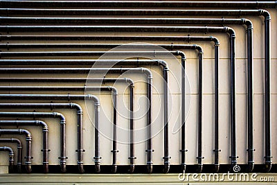 Piping on the wall with geometric shapes Stock Photo