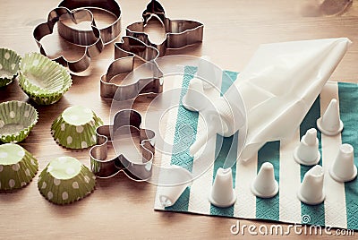 Piping bag set with cookie cutters and cups for cupcakes Stock Photo