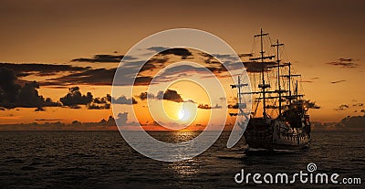 Pirate ship at the open sea Stock Photo