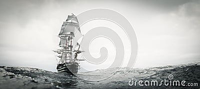 Pirate ship sailing on stormy ocean Stock Photo