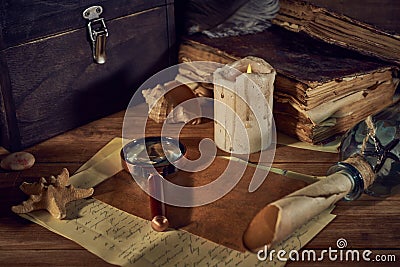 Pirate still life with a treasure chest on wooden table Stock Photo