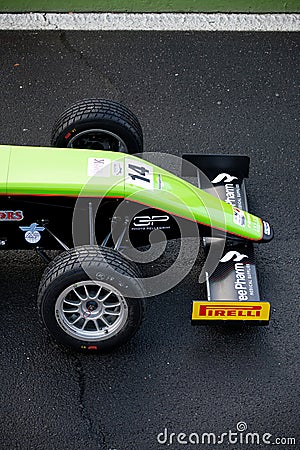 Pirelli wet racing tire on motorsport single seater car high angle view close up Editorial Stock Photo