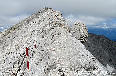 Pirin mountains in Bulgaria, gray rock summit during the sunny day with clear blue sky Stock Photo