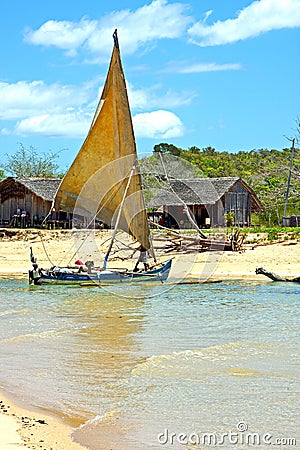 Pirogue beach seaweed in indian house sky and Stock Photo