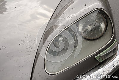 Headlight of a Citroen DS on a rainy day Editorial Stock Photo