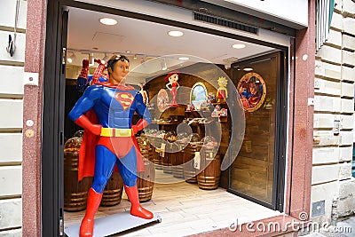 Pisa, Italy. September 16, 2023. A souvenir and candy shop with Superman and Spiderman in Pisa. Editorial Stock Photo