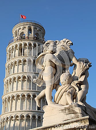 Pisa, PI, Italy - August 21, 2019: Tower of Pisa and Statues Editorial Stock Photo