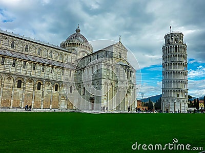 Pisa - Scenic view of Leaning tower of Pisa and the Baptistry and Duomo seen from Piazza dei Miracoli Stock Photo