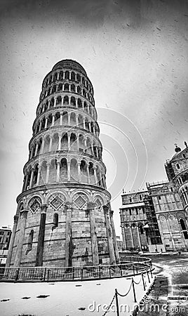 Pisa under the snow. Famous landmarks and monuments of Field of Miracles after a snowstorm Stock Photo