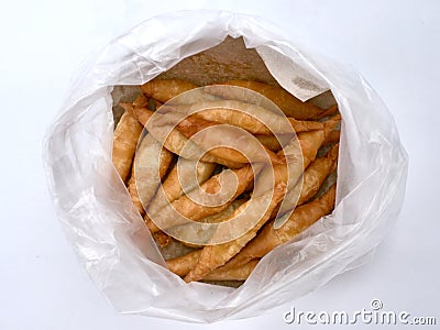 Pisang molen, banana fritters, traditional Indonesian snack streetfood, fried banana Stock Photo