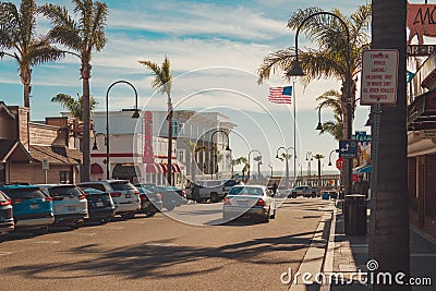 Pismo Beach Pier plaza. Shops, restaurants, traffic, walking people, downtown of city, city life Editorial Stock Photo