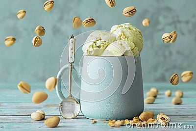 Pistachio ice cream in cup . Stock Photo