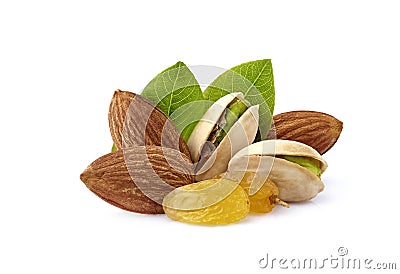 Pistachio nuts wits raisins, almonds and leaves in closeup isolated Stock Photo