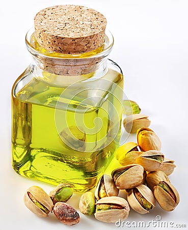 Pistachio oil with nuts Stock Photo